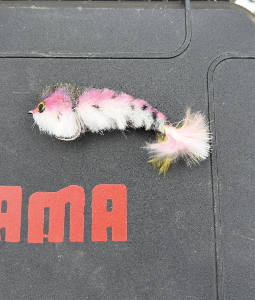 Hand-tied pink and white streamer fly
